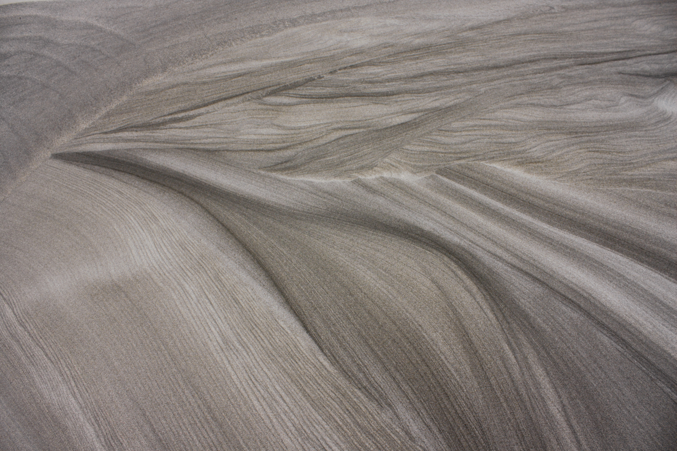 sand-patterns-wind-art-black-sand