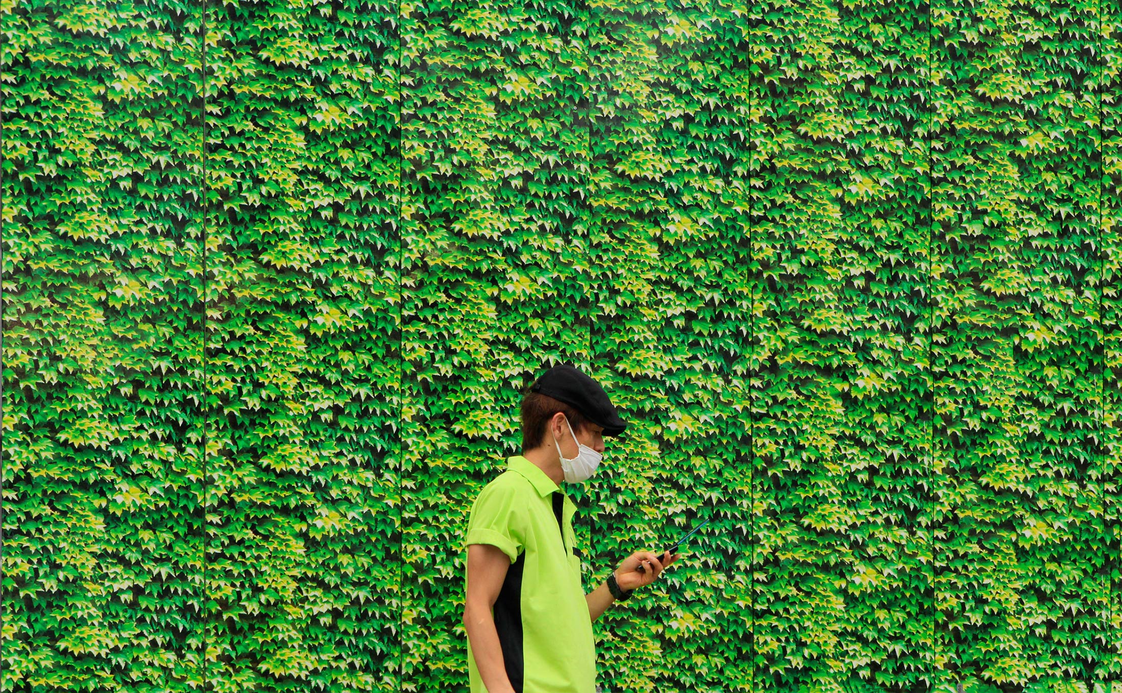 japan-man-on-phone-mask-leafs
