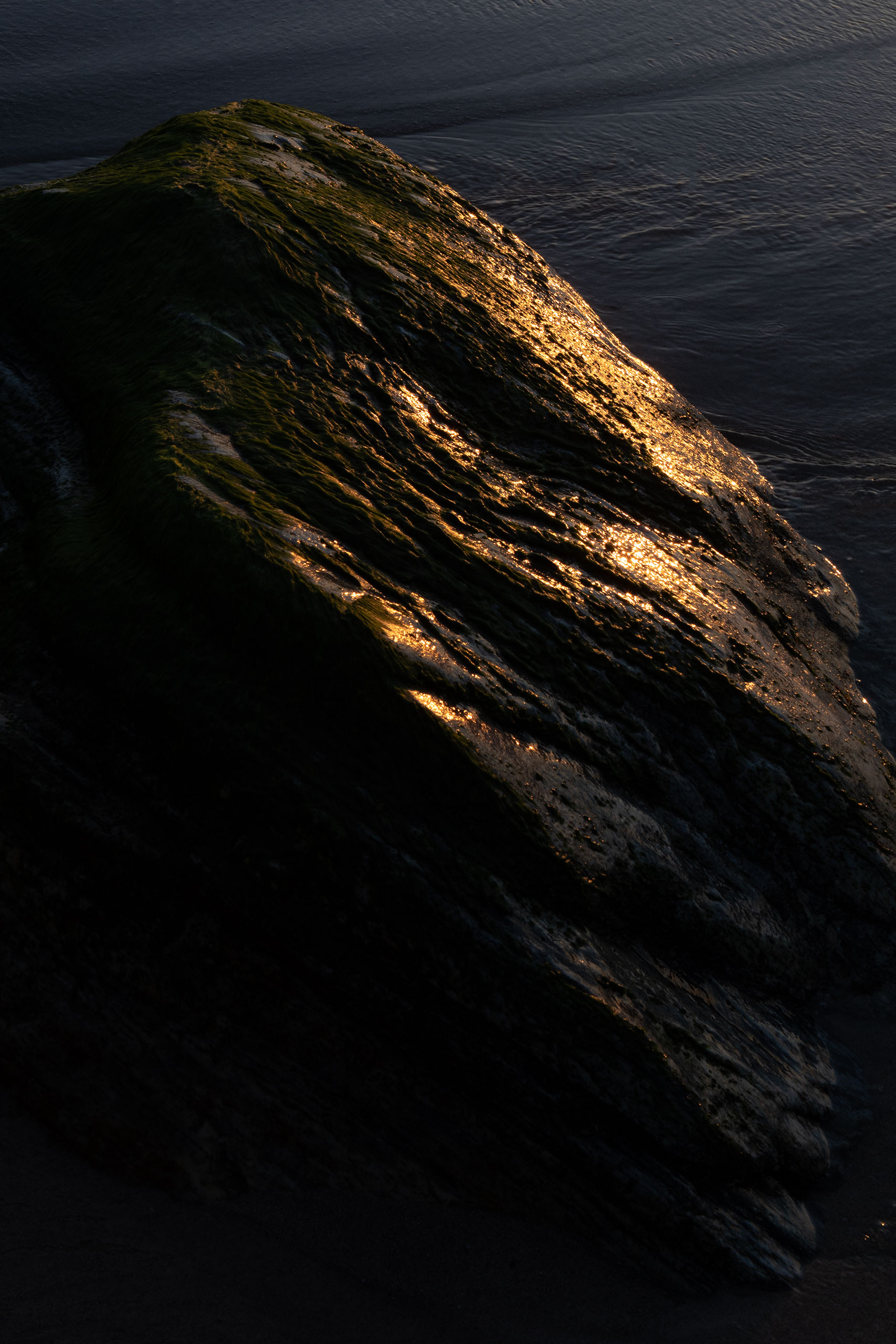sunlight-reflection-rock-sunset-beach